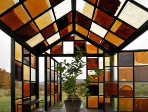 Stained glass in modern art is still alive and well. This piece, titled Solarium, is by William Lamson and was on display at Storm King Art Center. The windows get their color and texture from sugar, cooked to various temperatures and sandwiched between the panes. Image courtesy of Steven Severinghaus, taken 10/26/12