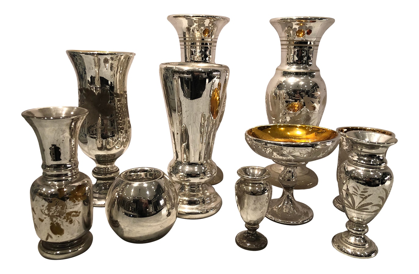Collection of seven antique mercury glass vessels selling for $750 at charish.com