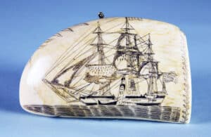 Authentic American scrimshaw can bring big bucks at auction. In 2017, Osana’s Auction sold a sperm whale tooth with crisp, clear carvings of the Pacific of Nantucket, signed in cursive “Made.By.Edward.Burdett” on the base. Bringing $252,000, this exquisite piece showed two scenes- the ship under full sail on the starboard side, and on the reverse, the port side under reduced sail with a whale alongside, engaged in the “cutting in” process. photo: Osana Auctions, Nantucket
