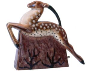 The gazelle, a popular Art Deco emblem, appeared in many guises, including on this nightlight by Camille Tharaud, the French master of Art Deco porcelain.