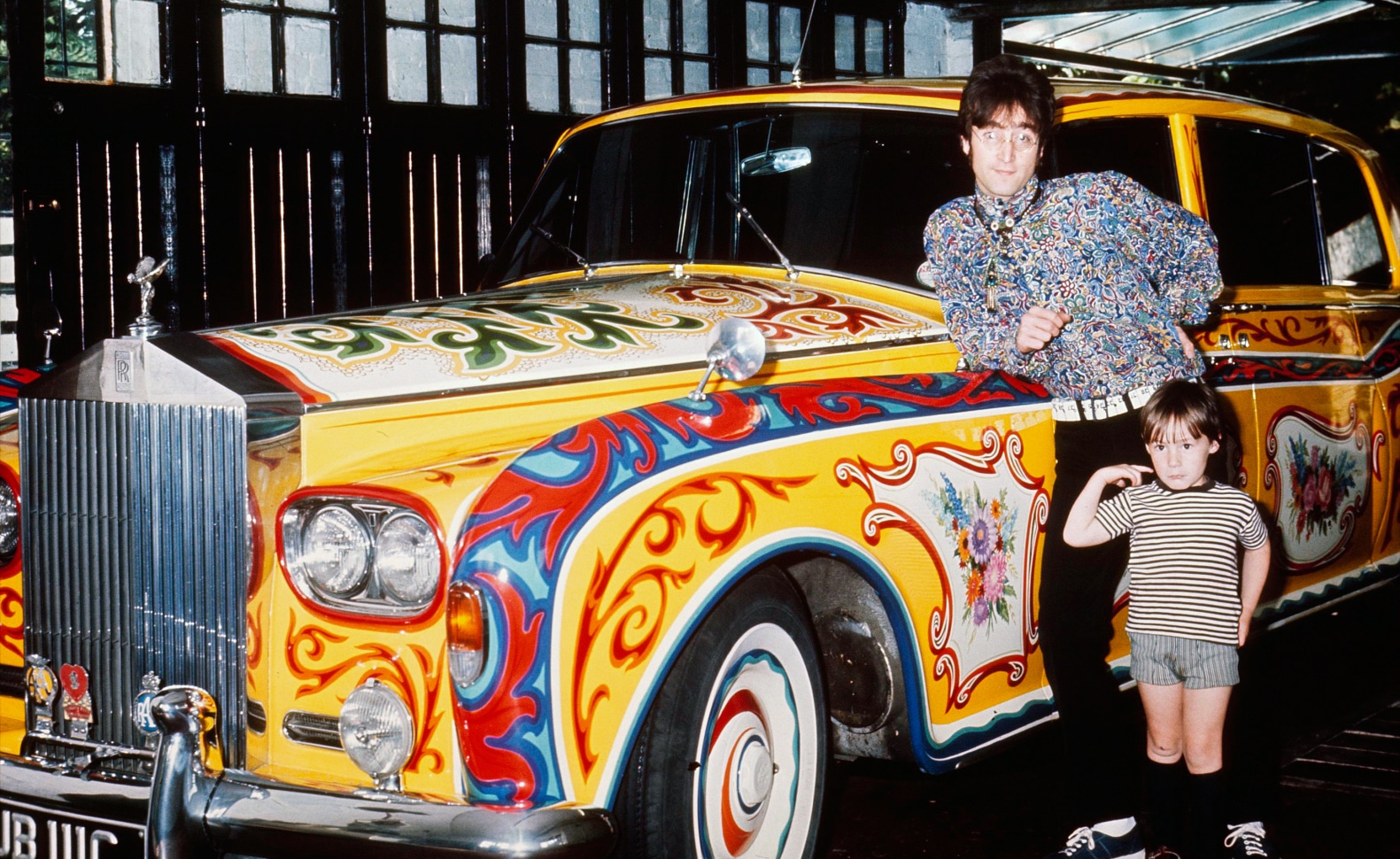 John Lennon’s Rolls-Royce Phantom V, his custom-painted psychedelic ride. An outraged Englishwoman screamed from the side of the road, “You swine! How dare you do that to a Rolls-Royce!” as John drove past.