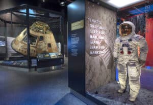 A view of the Destination Moon gallery featuring the Apollo 11 command module Columbia (above) and Neil Armstrong’s Apollo 11 spacesuit. (right)